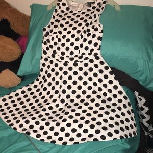 A white polka dot dress